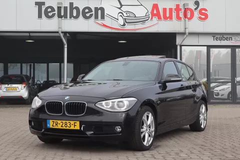 BMW 1-serie 118i Executive | Schuif-/kanteldak | Xenon | Parkeersensoren | Climate control